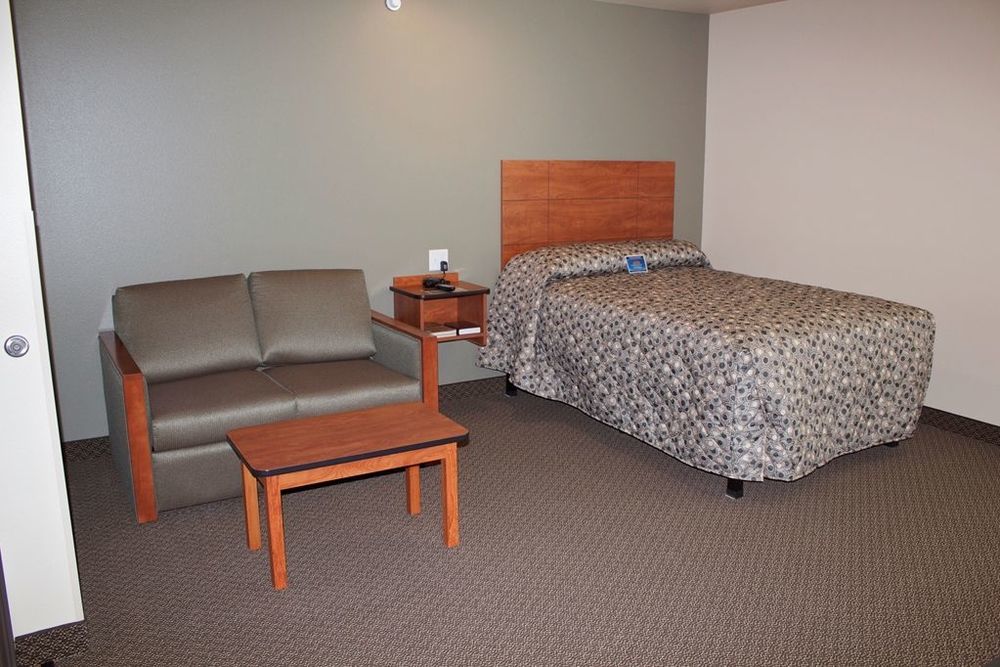 Suburban Studios Watford City Стая снимка