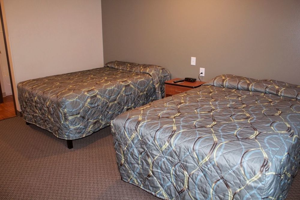 Suburban Studios Watford City Стая снимка